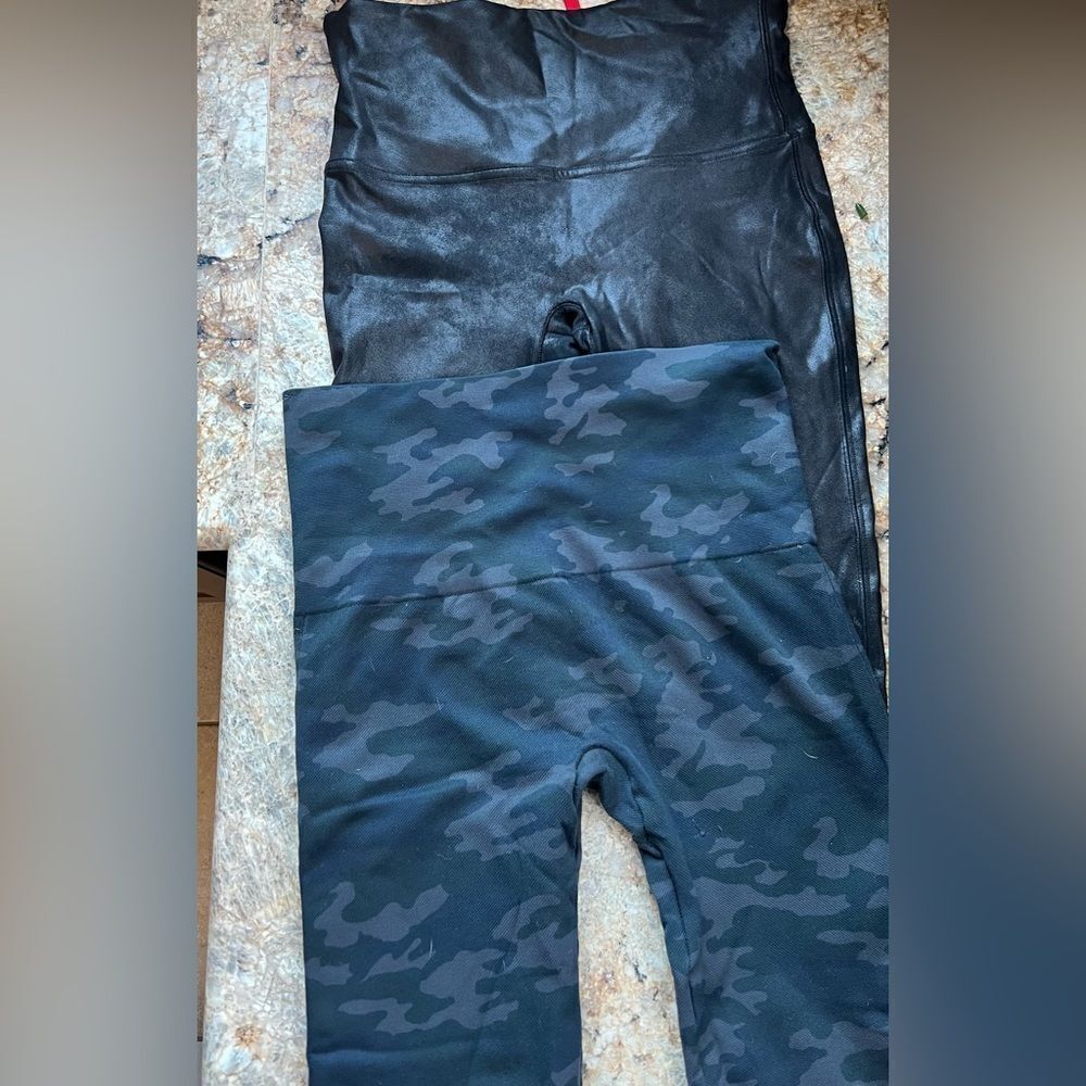 2 Spanx Black and Camouflage Leggings